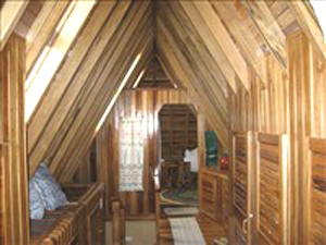 The hallway with closets connecting the two bedrooms.