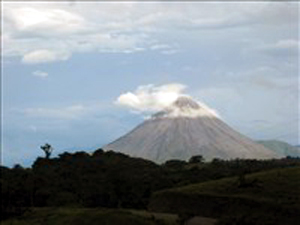 Arenal Volcano with a cloud necklace.