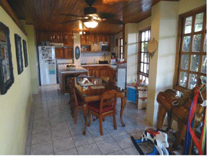 The spacious kitchen has lake and volcano views.