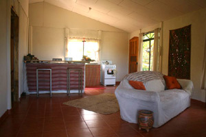 The kitchen area is at the far end of the open-plan interior.