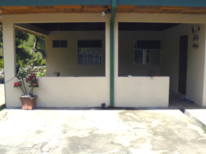 In addition to the separate garage, the home has a wide carport under the main roof. 