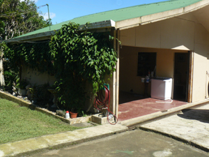 The separate locking garage also has a large laundry room.