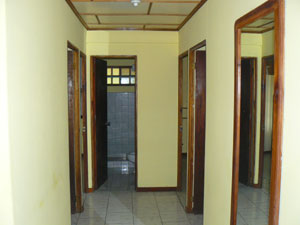 The large interior hallway serves 4 bedrooms and the bathroom.