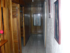 This hallway leads to 4 bedrooms and the bath.