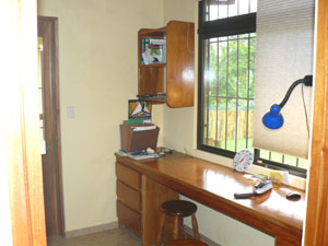 In the master suite is this office which also has a door for entrance from the veranda. 