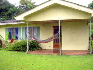 There's a small covered patio in front and large windows to take advantage of the territorial and slight lake views.