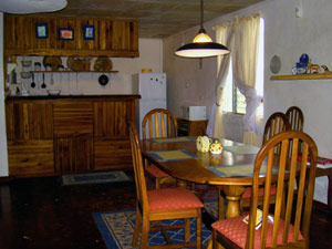 The dining area leads to  a pleasant updated kitchen