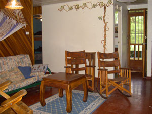 The living room, dining area and kitchen are in a nearly open plan.