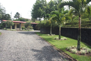 Inside the gale is the landscaped driveway to the owner's house.