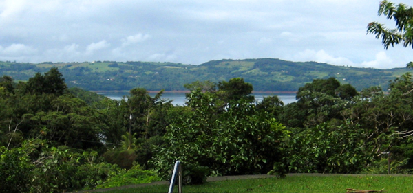 The home, in a hillside setting, has excellent lake views.