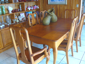 An exquisitely made native hardwood dining table and chairs are part of the fine furnishings that the owner has decided to part with.