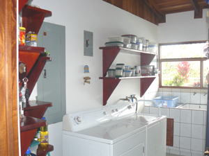 The large laundry room is behind the kitchen.