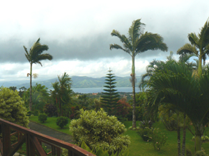 A view of Nuevo Arenal and the lake as seen from the home's wide patio. 