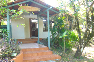 The entrance to the main house has a long, covered patio.