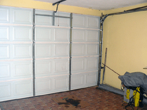 The large garage has an automated door.