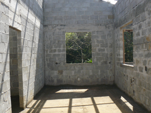 A third bathroom is off the living room.