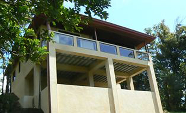 The home has an open-walled room under the deck overlooking the lake.