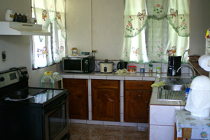 The kitchen is typical and could be extended. 