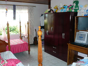 One of the three bedrooms.