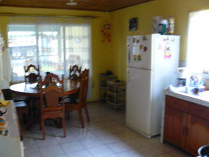 The dining area is part of the kitchen.