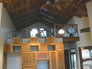 Custom kitchen cabinets have been installed. The loft is over the master suite beyond the kitchen.