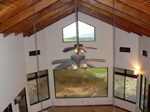 The loft overlooks the open interior and has some lake view. 