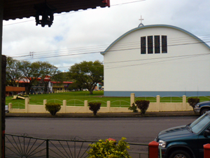 Across the street is the Cathedral and, as the view shows here, nearby are many stores, banks, supermarkets, and pharmacies.