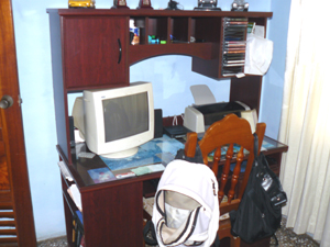 One of the bedrooms has become a computer room/office.