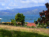 The hilltop house has a view over Lake Arenal.