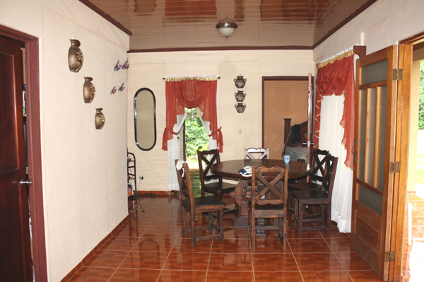 The dining room and extra area.