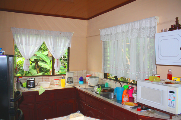 The kitchen is large and bright with copious counter space.