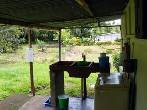 The laundry area is on the covered rear patio.