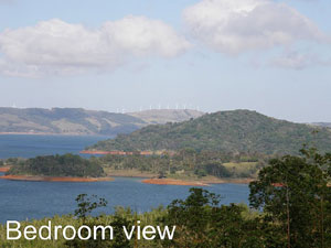 This bedroom view looks toward the north from one of the bedrooms.