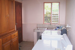 The utility room is another large and orderly space.