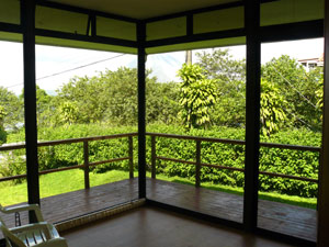 The center bedroom has a pleasant view of neighboring trees. 