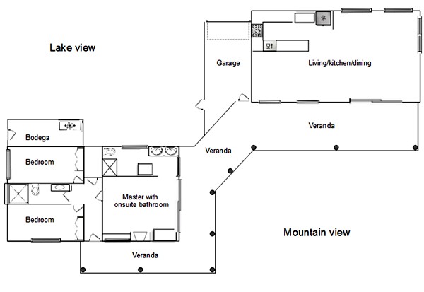 The floor plan shows the two buildings - bedroom and common areas - joined by the veranda.