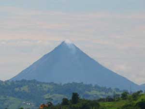 Arenal Volcano is beautiful by day, exciting with lava flows at night.