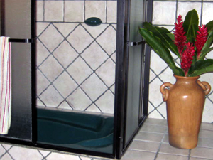 The master bathroom, one of three, has a tub and shower.