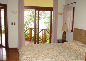 A bedroom opens onto the deck and has a nice lake view.