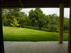 The master bedroom has sliding glass doors to the veranda which provide a nice view of the huge yard.