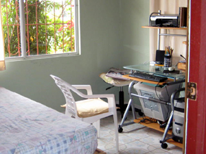 One of the three bedrooms on the main floor also serves as the computer room.