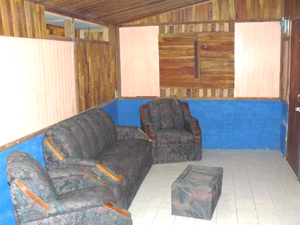 The inner sala or living room is partly furnished. 