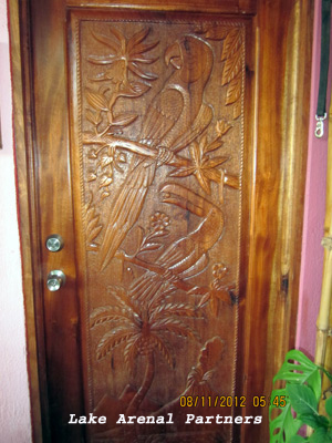 Carved hardwood door