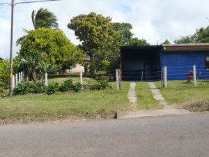 There's a carport and productive fruit trees.