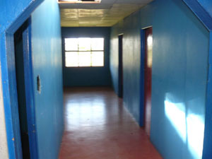 Here is the hallway leading to the living room in the right half of the home. 