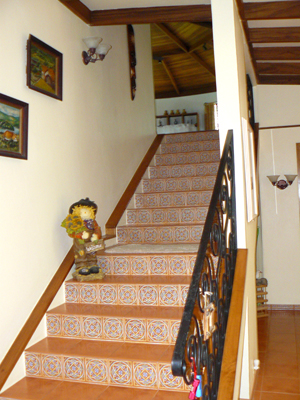 The stairway to the living room/kitchen rotundra.