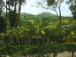 Looking back over the wall, one can see houses at the edge of Tronadora and the mountains that rise behind the village.