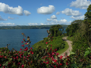 The home sits just above the unpaved road that follows the lake edge from Tronadora to Rio Chiquito.