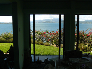 The home's large windows present the wonderful biws of the lake 100 yards below.