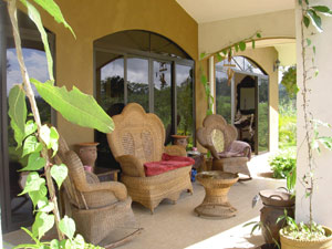 Thehandsome veranda on the lake side of the house is deep as well as wide.